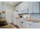 Bright kitchen featuring white appliances, granite countertops, and stylish backsplash at 1335 Hopton Cir # 1335, Mount Pleasant, SC 29466
