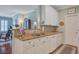 Well-lit kitchen with granite countertops, white cabinetry, and stainless steel sink at 1335 Hopton Cir # 1335, Mount Pleasant, SC 29466