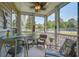 Relaxing screened porch with comfortable seating and a view of the outdoors at 1335 Hopton Cir # 1335, Mount Pleasant, SC 29466