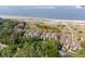 Aerial view of charming vacation home complex with beach access and beautiful water views at 1376 Pelican Watch Villas, Seabrook Island, SC 29455