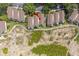 Drone shot showcasing residential townhomes near beach and winding pathways at 1376 Pelican Watch Villas, Seabrook Island, SC 29455
