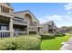 Inviting multi-level exterior featuring manicured landscaping, covered balconies, and classic architecture at 1376 Pelican Watch Villas, Seabrook Island, SC 29455