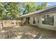 Large back deck is ideal for relaxation and enjoying the serene, wooded surroundings at 1445 Downwood Pl, Charleston, SC 29412