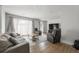 Comfortable living room with hardwood floors, a TV, and plenty of seating at 1445 Downwood Pl, Charleston, SC 29412