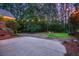 Enjoy the backyard featuring a fire pit under string lights, perfect for entertaining at 152 Candace Dr, Ridgeville, SC 29472
