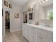 Bathroom featuring double sinks, tiled floors, and separate vanities at 152 Candace Dr, Ridgeville, SC 29472