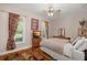Cozy bedroom with hardwood floors, ceiling fan, and natural light at 152 Candace Dr, Ridgeville, SC 29472