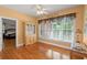 Traditional dining room with hardwood floors, large window, and hutch cabinet at 152 Candace Dr, Ridgeville, SC 29472