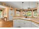 Kitchen featuring white cabinetry, hardwood floors and stainless steel appliances at 152 Candace Dr, Ridgeville, SC 29472
