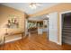 Open living space seamlessly connects to dining and kitchen areas with hardwood floors at 152 Candace Dr, Ridgeville, SC 29472