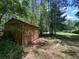 Solid storage shed in the yard, perfect for tools and equipment at 152 Candace Dr, Ridgeville, SC 29472