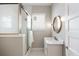This bathroom has a glass shower, white subway tile, and a granite countertop vanity at 158 Darlington Ave, Charleston, SC 29403