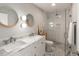 This bathroom features dual marble vanity and a glass shower at 158 Darlington Ave, Charleston, SC 29403