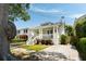 Charming traditional home with a welcoming front porch and well-manicured landscaping at 158 Darlington Ave, Charleston, SC 29403
