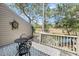Outdoor patio features a table and chairs, plus scenic views of marshland and trees at 166 River Breeze Dr, Charleston, SC 29407