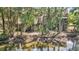 Scenic backyard with multiple decks, offering tranquil waterfront views and serene natural surroundings at 166 River Breeze Dr, Charleston, SC 29407