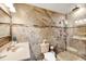 Bathroom showcases tiled walls, glass shower, and vanity with sink, creating a modern, spa-like feel at 166 River Breeze Dr, Charleston, SC 29407