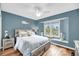 Coastal bedroom featuring wood floors, a window seat, and nautical decor for a relaxing beach-themed space at 166 River Breeze Dr, Charleston, SC 29407