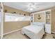 Light-filled bedroom with a built-in shelving unit, a window shelf, and a cozy, inviting atmosphere at 166 River Breeze Dr, Charleston, SC 29407