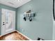 Cozy entryway features a mounted coatrack and easy access to the exterior at 166 River Breeze Dr, Charleston, SC 29407
