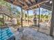 Inviting outdoor patio with plush seating, tranquil waterfront views, and a relaxing atmosphere at 166 River Breeze Dr, Charleston, SC 29407