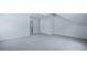 An attic bedroom with cozy carpeting, natural light, and a closet at 187 E Pinckney St, Summerville, SC 29485