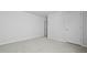 Neutral bedroom with gray carpeting and a closet, ideal for personalization at 191 E Pinckney St, Summerville, SC 29485