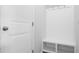 Mud room with built-in bench and cubbies, enhancing organization and style at 191 E Pinckney St, Summerville, SC 29485