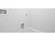 Utility connections and bright white paint in the spacious laundry room at 191 E Pinckney St, Summerville, SC 29485
