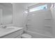 A clean bathroom featuring a tub and shower combination with a white surround and a single sink vanity at 199 E Pinckney St, Summerville, SC 29485