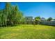 Spacious backyard with lush grass and a swingset at 208 Waterford Ln, Summerville, SC 29483