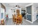 Cozy dining room featuring a wooden table set, modern lighting, and stylish decor at 208 Waterford Ln, Summerville, SC 29483