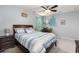Comfortable bedroom with a ceiling fan, natural light, and calming blue accents at 214 Blackstone Dr, Moncks Corner, SC 29461