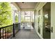 Spacious screened-in porch with comfortable seating, ideal for relaxing outdoors at 2213 Rolling Dune Rd, Seabrook Island, SC 29455
