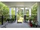 Inviting back porch overlooking the beautiful garden and backyard at 2213 Rolling Dune Rd, Seabrook Island, SC 29455