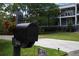 Charming home exterior featuring a mailbox adorned with flowers and a welcoming porch sign at 2213 Rolling Dune Rd, Seabrook Island, SC 29455