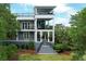 Three-story home with multiple balconies and covered porch offers stunning views and outdoor living at 2213 Rolling Dune Rd, Seabrook Island, SC 29455