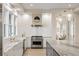 Contemporary kitchen with an island, stainless steel appliances, marble countertops, and pendant lighting at 2213 Rolling Dune Rd, Seabrook Island, SC 29455