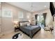 Bright main bedroom featuring neutral tones, natural light, and private balcony access with outdoor views at 2213 Rolling Dune Rd, Seabrook Island, SC 29455