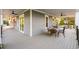Inviting outdoor porch featuring a dining set, a hammock, and a tranquil view at 2213 Rolling Dune Rd, Seabrook Island, SC 29455