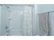 Neutral toned bathroom with a shower and towel rack at 2234 Mother Of Pearl Dr, Mount Pleasant, SC 29466