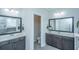 This bathroom features dual sinks and dark wood cabinets at 2234 Mother Of Pearl Dr, Mount Pleasant, SC 29466