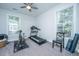 Neutral toned exercise room with a stationary bike and treadmill at 2234 Mother Of Pearl Dr, Mount Pleasant, SC 29466