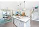 Bright, modern kitchen featuring a spacious island with quartz countertops and stainless steel appliances at 2234 Mother Of Pearl Dr, Mount Pleasant, SC 29466