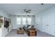 Spacious living room with a ceiling fan and built in shelving at 2234 Mother Of Pearl Dr, Mount Pleasant, SC 29466