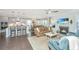 Spacious living room with modern furniture, open to the kitchen and dining area at 2234 Mother Of Pearl Dr, Mount Pleasant, SC 29466