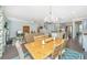 Bright living room with modern lighting, wood floors and stainless steel appliances at 2234 Mother Of Pearl Dr, Mount Pleasant, SC 29466