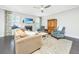 Inviting living room with a cozy fireplace, ceiling fan, and comfortable seating at 2234 Mother Of Pearl Dr, Mount Pleasant, SC 29466