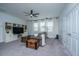 Spacious living room with a ceiling fan and built in shelving at 2234 Mother Of Pearl Dr, Mount Pleasant, SC 29466