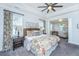 Bright main bedroom with a ceiling fan and water view at 2234 Mother Of Pearl Dr, Mount Pleasant, SC 29466
